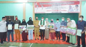 Read more about the article Bupati Pelalawan Serahkan Sertipikat PTSL Kepada Masyarakat Kec. Pangkalan Kuras