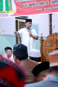 Read more about the article Laksanakan Kegiatan Magrib Mengaji Bersama Masyarakat Sorek, Bupati Pelalawan Ajak Masyarakat Hidup Rukun dan Tolong Menolong